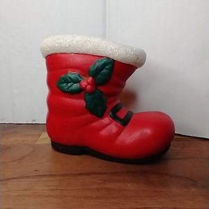 Vintage smalle red and white Santa's boot with a black buckle and a holly sprig